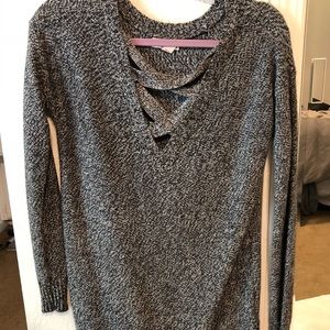 Oversized sweater with criss cross cutout